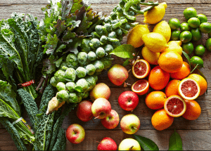a group of fruits and vegetables on a wood surface Healthy Weight Loss Diets Eynsham